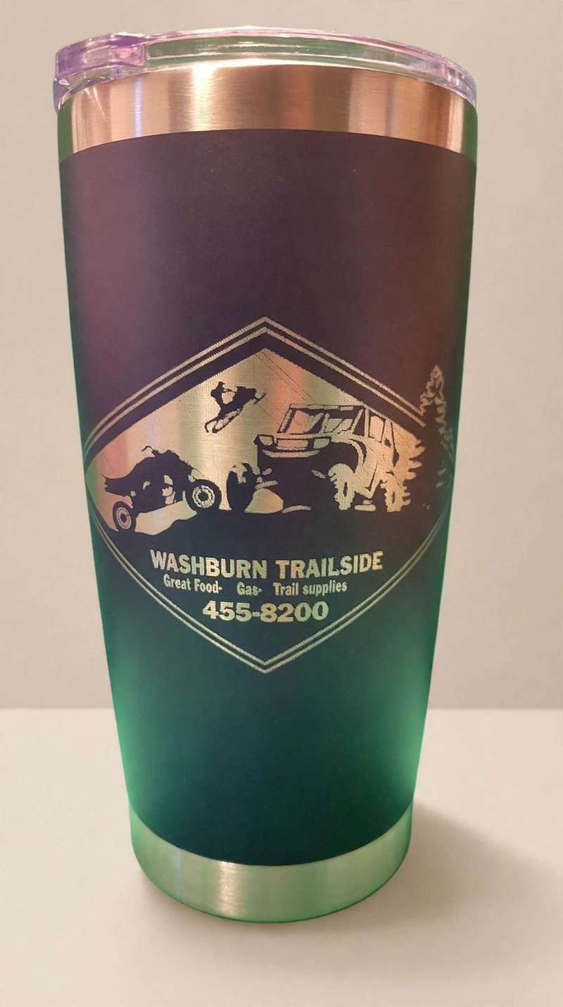 Navy tumbler etched with Washburn Trailside logo