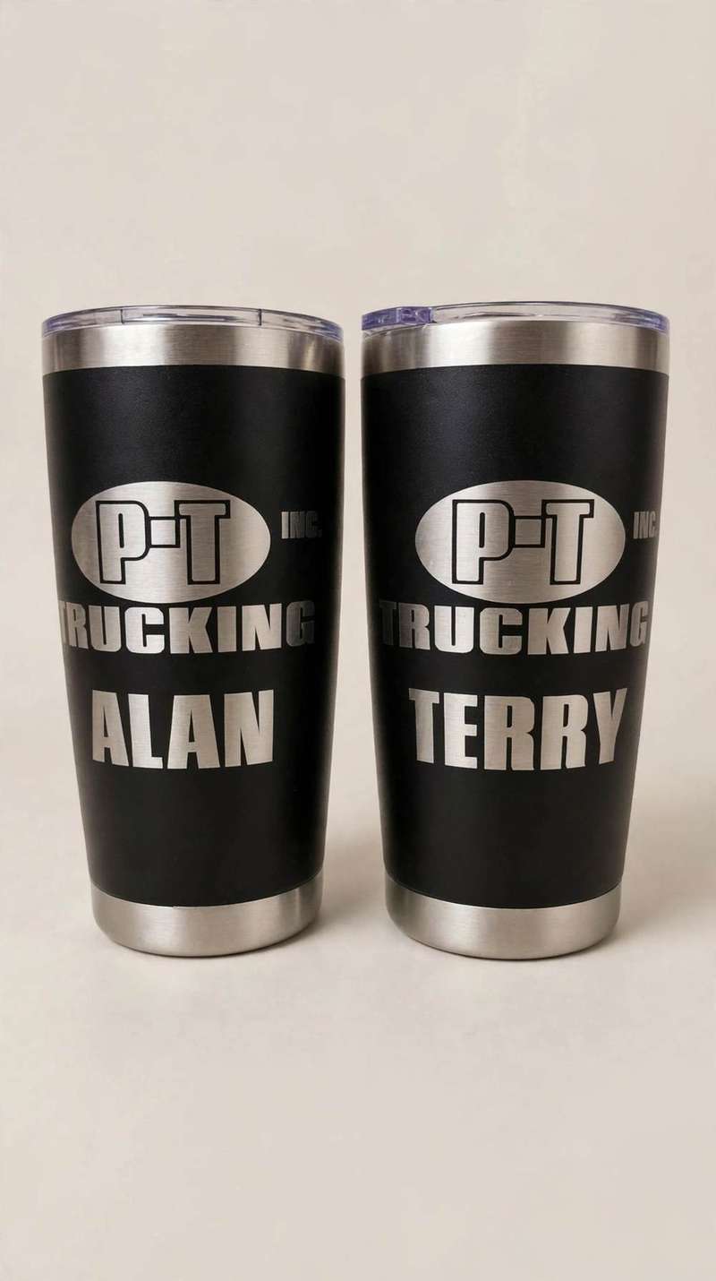 Two black tumblers etched with P&T Trucking logo, names Alan and Terry
